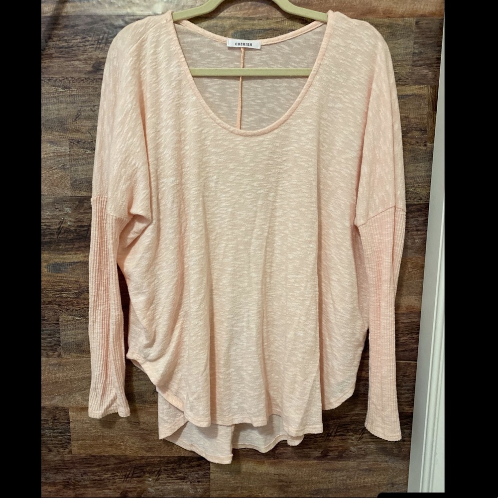 Super soft pink sweater with tight sleeve detail